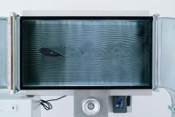 Visualisierung der Umströmung eines Rotorblattprofils in einem Windkanal.  Quelle: Ernst Weerts  Copyright: Hochschule Emden/Leer